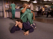 3x11 Turk sits on JD