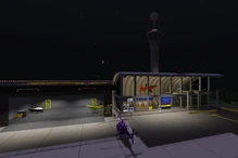 Yeager-Field-Terminal-at-Night 001-pub.png (497 KB) Yeager Field passenger teriminal and FOB hangar at night, May 2015.