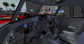 Cockpit with pilot/co-pilot seating and instrumentation.