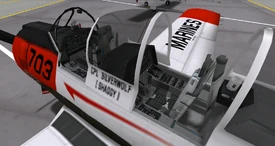 Open canopy revealing cockpit with pilot and co-pilot seating.