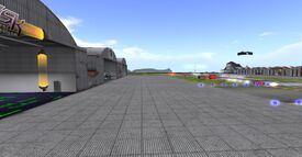 SLWB, s/e corner looking west past the large USAAF hangars towards the water and the opposite coast (August 2014).