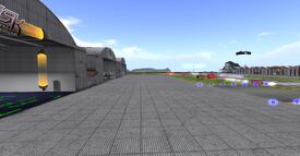 SLWB, s/e corner looking west past the large USAAF hangars towards the water and the opposite coast (August 2014).