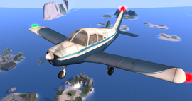 Piper PA-28 Cherokee in flight above the Seychelles Estate.