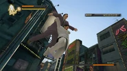 Kiryu about to hit an opponent. On the floor.