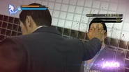 Kiryu hits an opponent