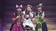 Yoshino Nanjō, Yōko Hikasa and Ai singing Arigatō wo Utai Nagara during Symphogear Live 2016.