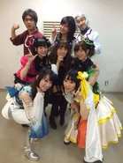 Ai along with the rest of the cast during Symphogear Live 2013.