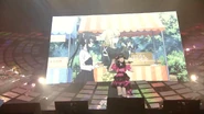Yoshino singing PRACTICE MODE during Symphogear Live 2013.