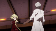 Carol shakes hands with Dr. Ver