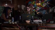 Amanita and Nomi helping one of the 8/8 sensates through hacking.