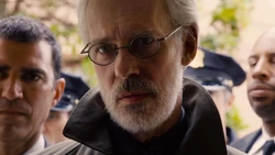 Whispers introduces himself as Dr. William Friedmann to Amanita's mother, as he attempts to hunt down Nomi.