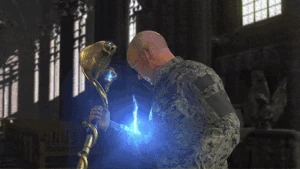 Brand undergoing a mutation after being bitten by the cobra on the False Grail.