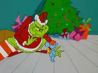 Grinchstole-animationscreencaps.com-2153.webp (69 KB) ...including stealing some wind-up toys...