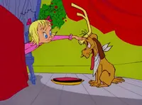 Grinchstole-animationscreencaps.com-3062.webp (64 KB) Cindy Lou gives Max a slice of the roast beast.