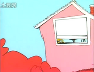 A pink house that was white in the book
