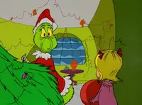 Grinchstole-animationscreencaps.com-1938.webp (79 KB) Cindy Lou Who catches the Grinch in the act.