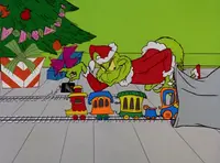 Grinchstole-animationscreencaps.com-2221.webp (86 KB) ...and a toy train.