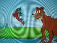 A grizzly attempts to catch Samantha Salmon