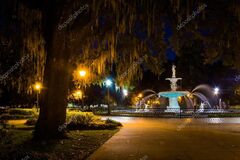 Depositphotos 58409003-stock-photo-oak-tree-and-fountain-at