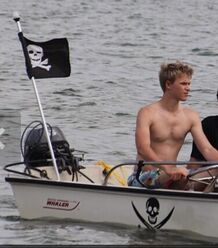 Kenton-duty-on-a-boat-shirtless