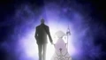 Sydonay and Hecate holding hands and walking towards a white light
