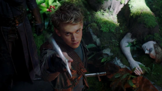 Wil looks at the Sword of Shannara after recovering it from Shea's corpse.