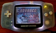 An Afterburner-equipped GBA featuring Advance Wars.