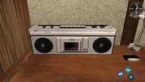Silver Cassette Player in Ryo's room.