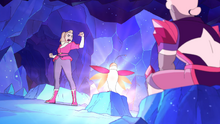 Glory lights up a cave after being startled by Adora.