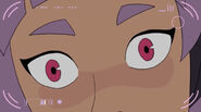 The camera opens on a close-up of Entrapta’s face
