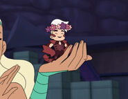 Tiny Scorpia with a flower crown