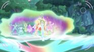 The sword lodges itself into the ground, creating some kind of rainbow wave