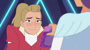 Adora smiles awkwardly as Glimmer shows her there’s food in Darla’s ship