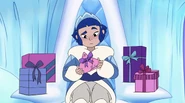 Frosta, examining a present, looks confused