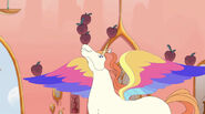 Swift Wind balances apples on his head, horn and wings