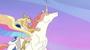 Swift Wind flying with She-Ra and Frosta on his back