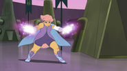 Glimmer readies a sparkle attack while fighting Catra