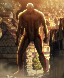 L'apparizione del Gigante Corazzato a Shiganshina.