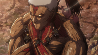 On Reiner's back while the 104th try to talk them down