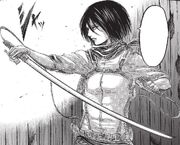 Mikasa reta a Annie.