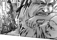 A Titan bites Reiner's arm