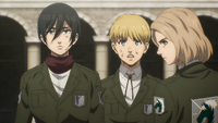 Mikasa with Armin and Hitch in the bombing's aftermath