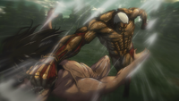 Reiner punches Eren hard enough to knock him over