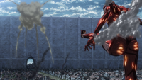 The Colossal Titan kicks Eren
