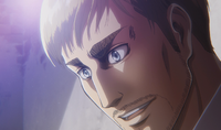 Erwin smiles at the revelation of the Titans' origin