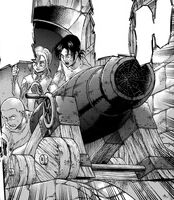 Ymir helps push a cannon to save Reiner and Bertolt