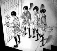 Eren attempts to open the basement door