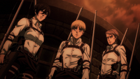 Armin, Mikasa, and Jean look at Pyxis's Titan