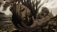 Eren's head is caught by Zeke