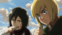 Armin and Mikasa eat their military biscuits